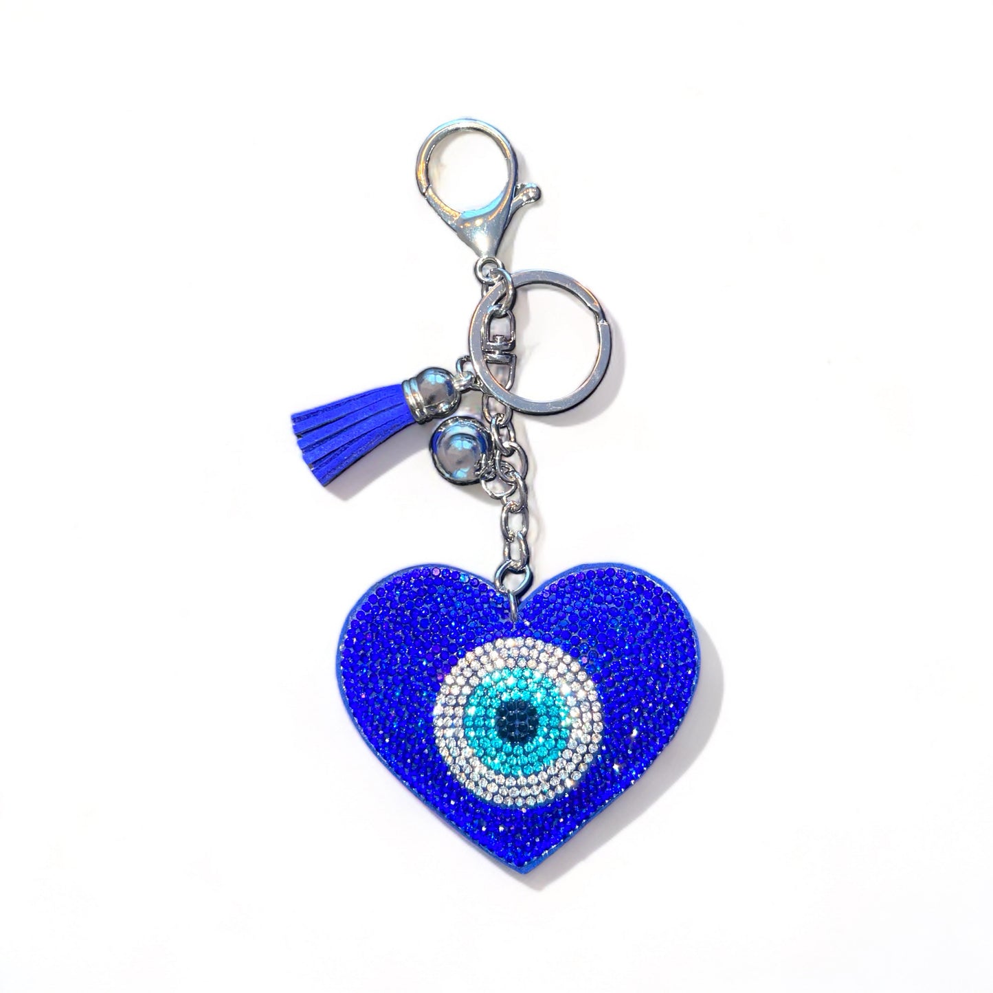 Donkerblauwe Nazar Heart sleutelhanger: een stijlvolle en functionele toevoeging aan je sleutelbos voor bescherming en stijl. Gemaakt van duurzaam materiaal.