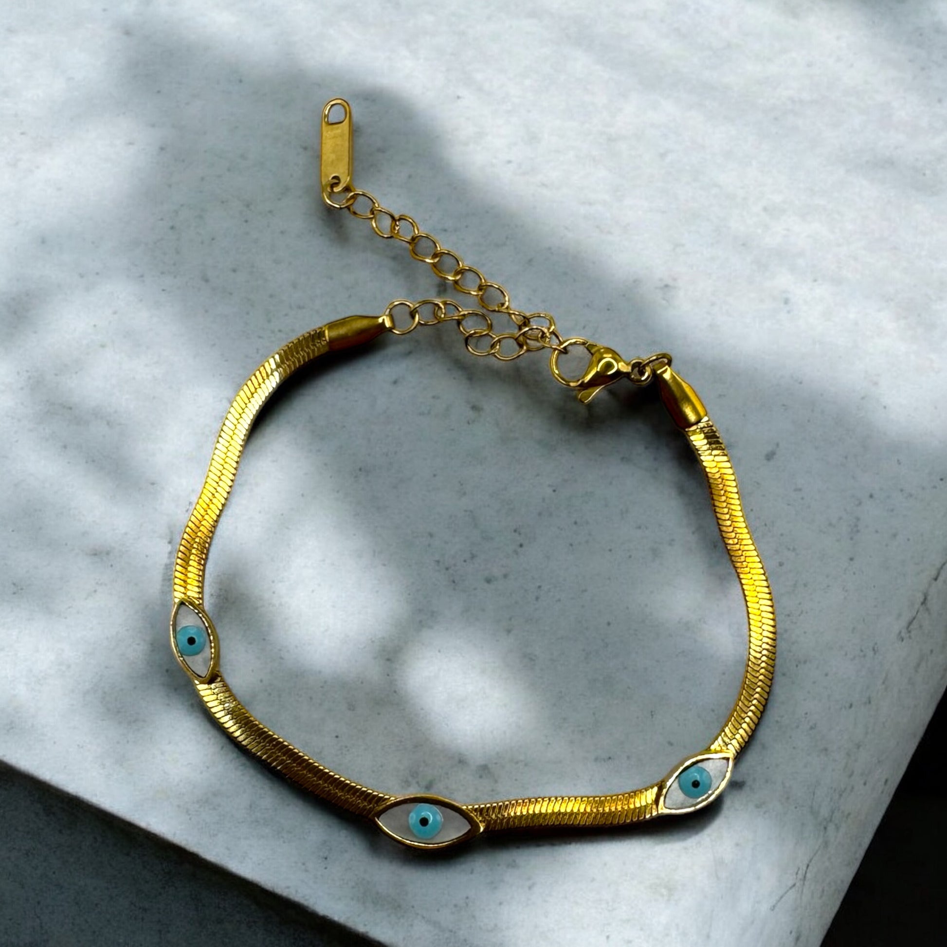 Beschermende boze oog armband, goudkleurig en verstelbaar